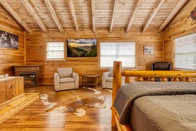 Ole Red upper level bedroom with year round electric fireplace