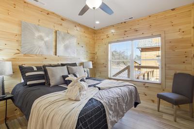 Let The Good Times Roll main level bedroom with king size adjustable bed