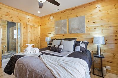 Main level bedroom with king size bed 