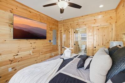 Let The Good Times Roll main level bedroom with king size adjustable bed