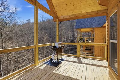 Let The Good Times Roll main level deck with gas grill