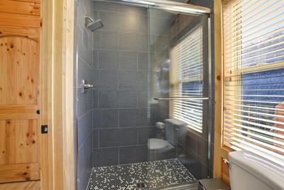 Let The Good Times Roll upper level bathroom with walk in shower