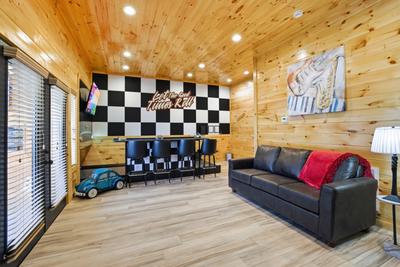 Let The Good Times Roll lower level game room with duck pin bowling