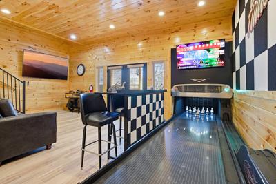 Let The Good Times Roll duck pin bowling and lower level sitting area