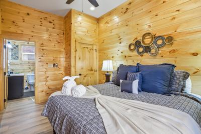 Let The Good Times Roll lower level bedroom with king size bed