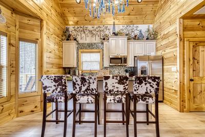 Firefly Strike Retreat kitchen island and high top bar stools