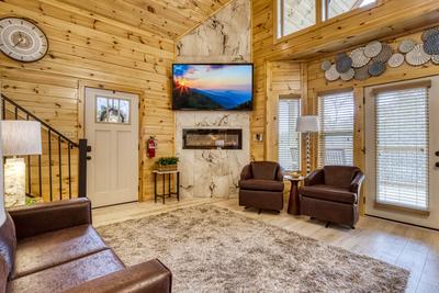 Firefly Strike Retreat living room with 75 inch TV