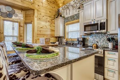 Firefly Strike Retreat fully furnished kitchen with granite countertops