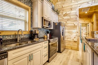 Firefly Strike Retreat kitchen island and fully furnished kitchen