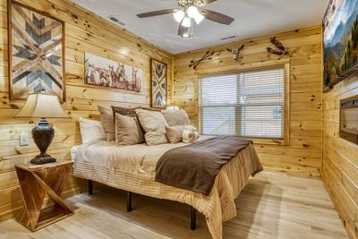 Firefly Strike Retreat main level bedroom with king size adjustable bed