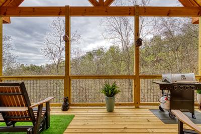 Firefly Strike Retreat main level deck with gas grill 