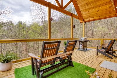 Firefly Strike Retreat main level deck with gas grill and mountain views