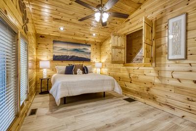 Firefly Strike Retreat upper level bedroom with king size bed