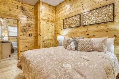 Firefly Strike Retreat lower level bedroom with king size adjustable bed