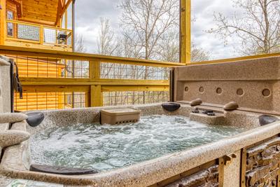 Firefly Strike Retreat lower level deck with hot tub