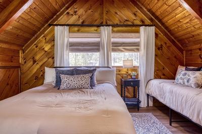 Sweet Dreams loft area bedroom with queen and twin size beds