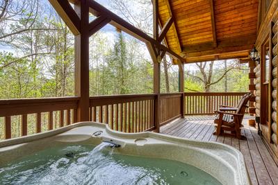 Sweet Dreams hot tub on wrap around covered deck