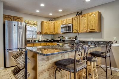 Triple the Mountain View fully furnished kitchen with granite countertops 