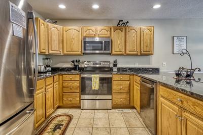 Triple the Mountain View fully furnished kitchen with stainless steel appliances