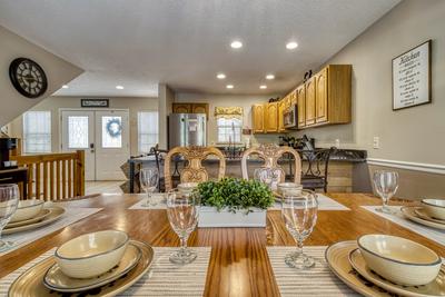 Triple the Mountain View dining room and fully furnished kitchen