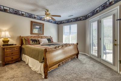 Triple the Mountain View upper level bedroom two with deck access