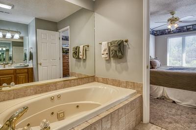 Triple the Mountain View upper level bathroom two with whirlpool tub