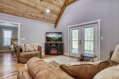 Mountain Lake Home living room with year round electric fireplace