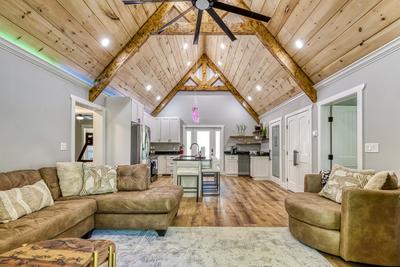 Mountain Lake Home living room and fully furnished kitchen