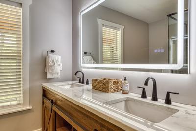 Mountain Lake Home bathroom with double vanity
