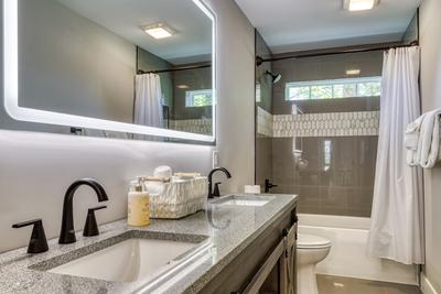 Mountain Lake Home bathroom with tub/shower combo