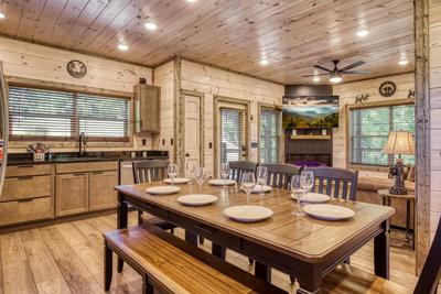 Honey Bear dining room, fully furnished kitchen, and living room