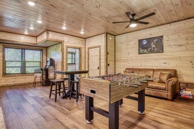 Honey Bear foosball table in lower level game room