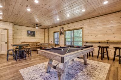 Honey Bear pool table in lower level game room