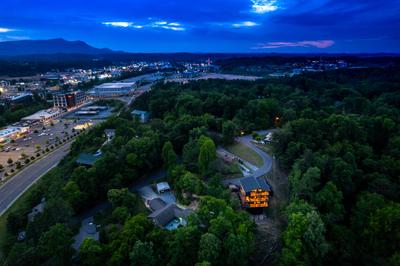 Honey Bear aerial view at dusk showing location to downtown Pigeon Forge
