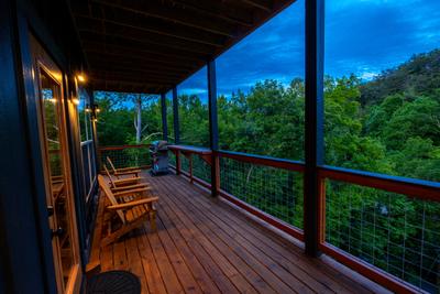 Honey Bear covered wrap around deck with gas grill
