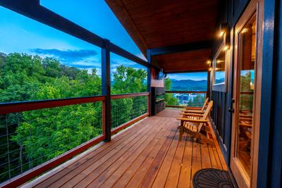Honey Bear wrap around deck with mountain and city views