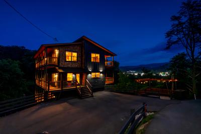 Honey Bear cabin and parking area at night