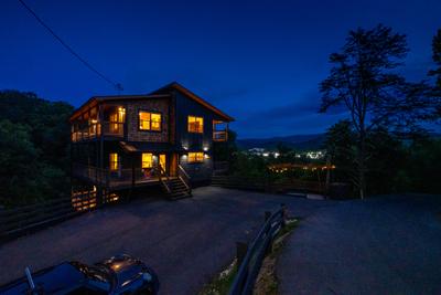 Honey Bear cabin and downtown Pigeon Forge at night