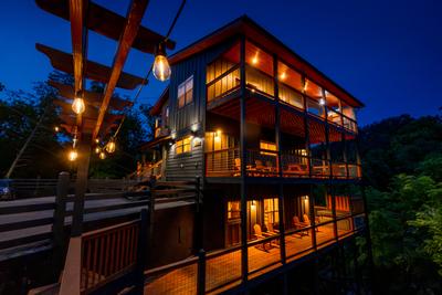Honey Bear three wrap around covered decks and observation deck at night