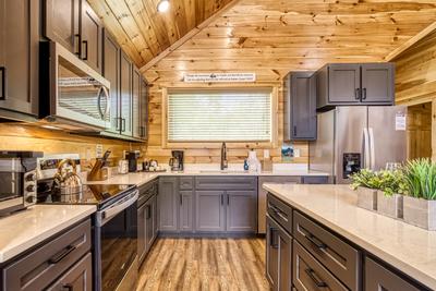 Mountain Memories granite countertops and stainless steel appliances