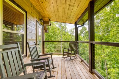 Mountain Memories rocking chairs on main level covered back deck