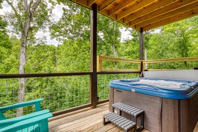 Mountain Memories hot tub on lower level covered deck