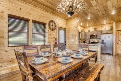 In The Clouds dining room and fully furnished kitchen
