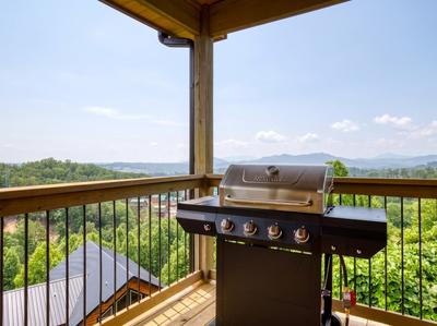 In The Clouds main level deck with propane grill