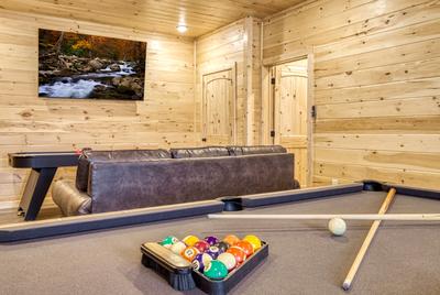 In The Clouds pool table in the lower level game room