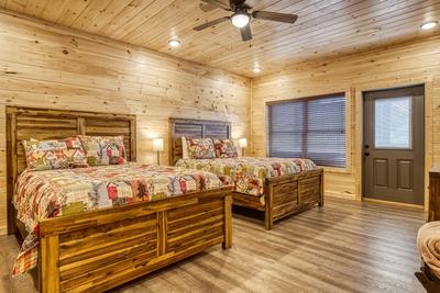 In The Clouds lower level bedroom with two queen size beds