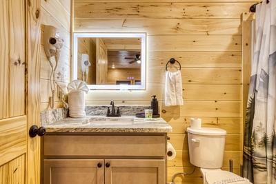 In The Clouds lower level bathroom with heated mirrors