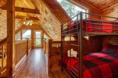 Bearadise Mountain Lodge upper level loft area with bunk beds