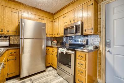 Ober the Rainbow fully furnished kitchen with granite countertops