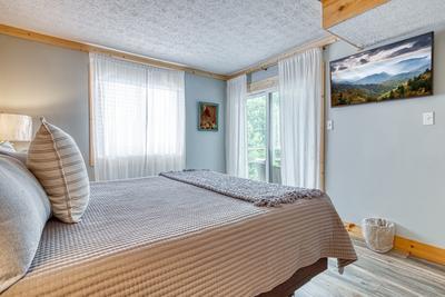 Ober the Rainbow bedroom two with king size bed and balcony access